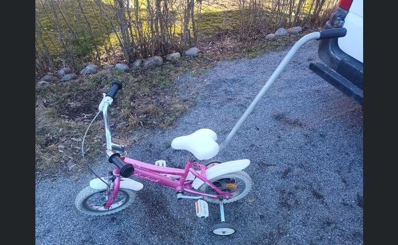 Tyttöjen pinkki ensipyörä 12